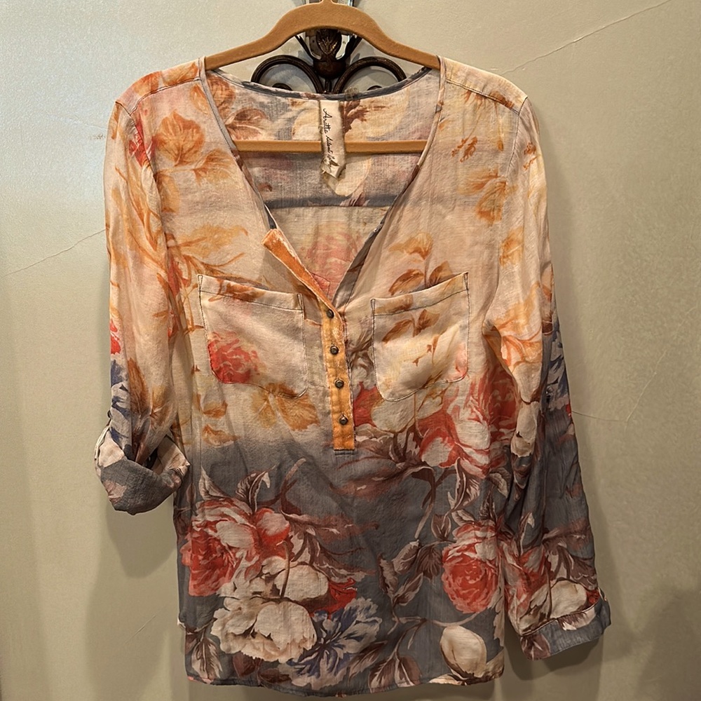 Light weight cotton embroidered blouse w/ velvet trim at buttons.